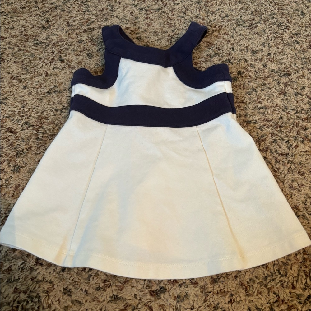 Janie & Jack infant dress 6-12 months.Off white/navy blue trim.